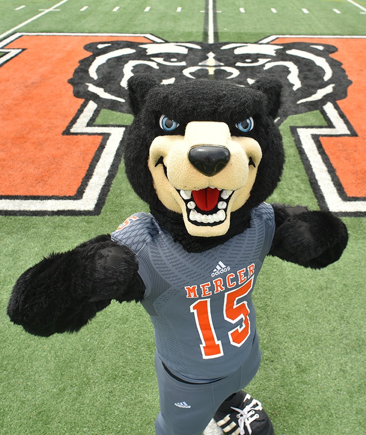 Mercer mascot Toby stands on the football field.