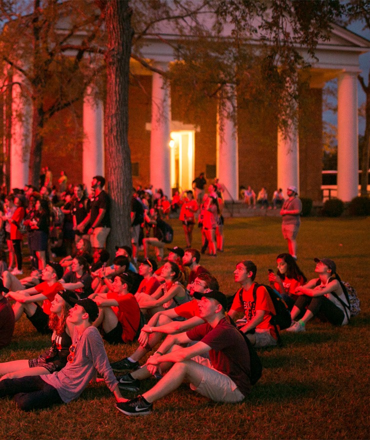 Students watch fireworks during a Pilgrimage to Penfield event.