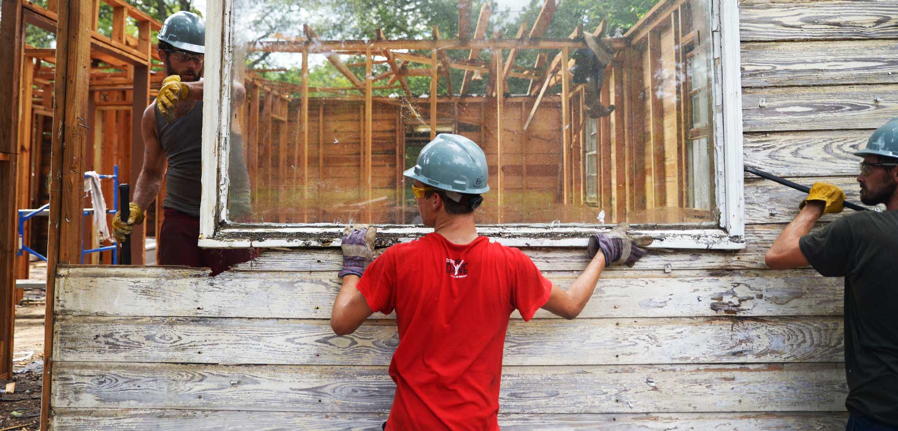 Mercer team members work on blighted homes in Georgia.