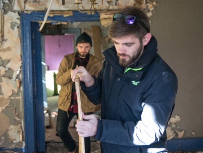 Mercer team members work on blighted homes in Georgia.