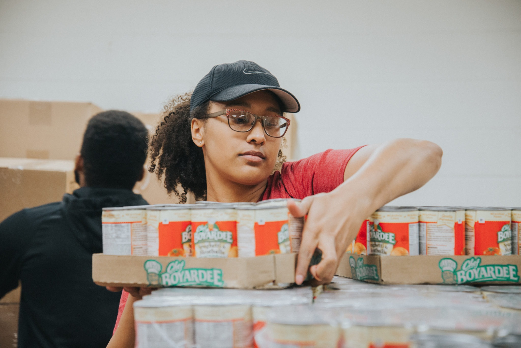 A Mercer University student volunteers at the food bank.