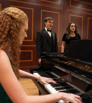 Pianist accompanies music students