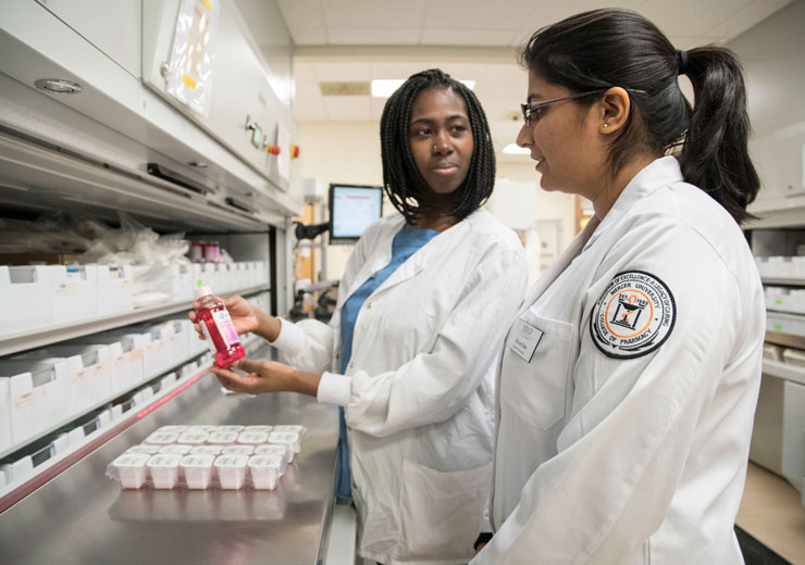 Pharmacy students in lab