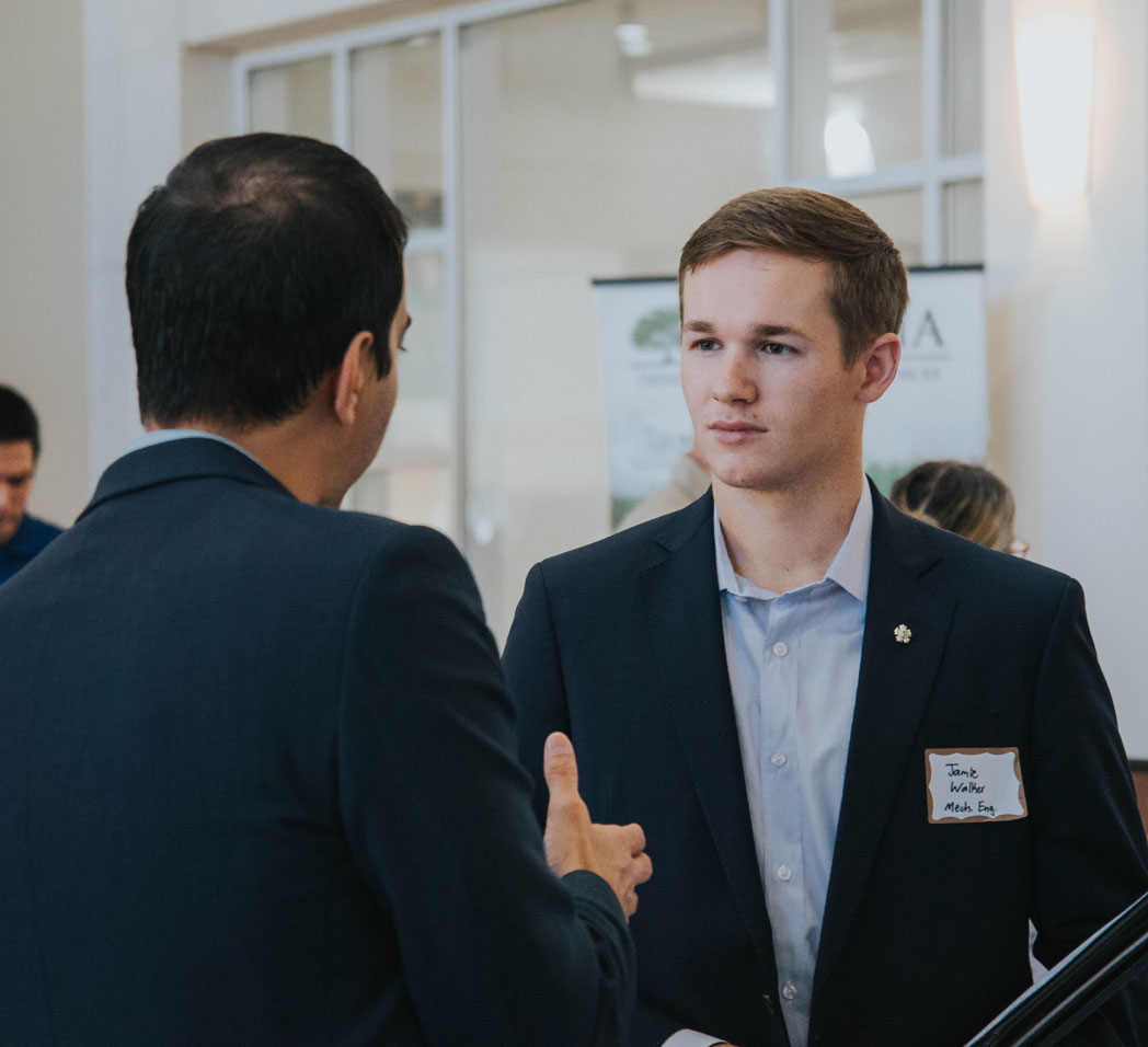 Student networking at career fair