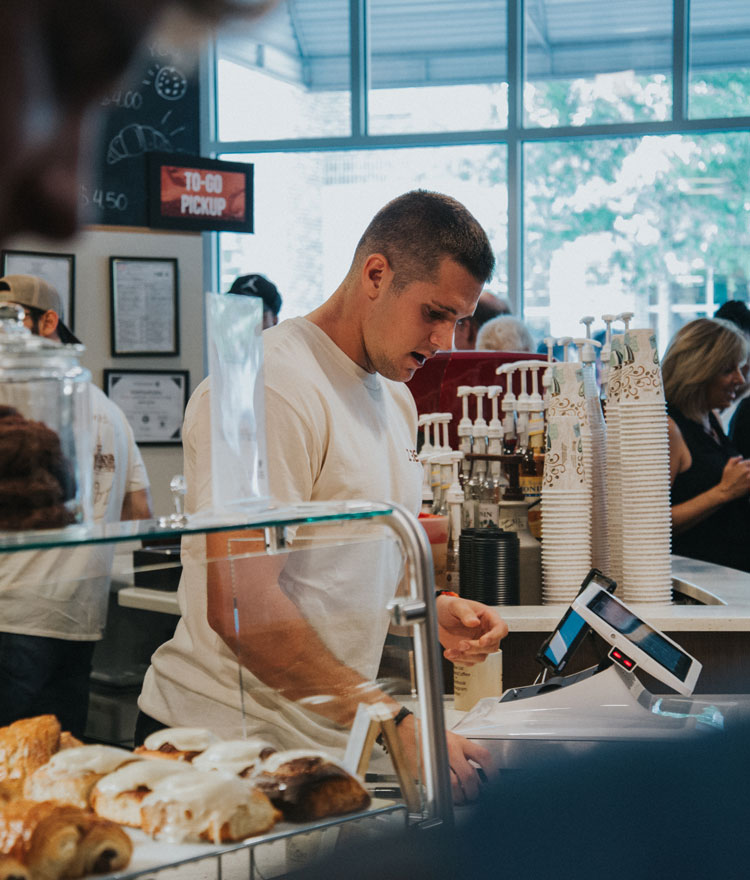 Barista making a drink at Z Beans Coffee