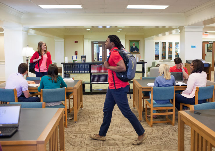 Students study inside the Furman Smith Law Library in Macon.