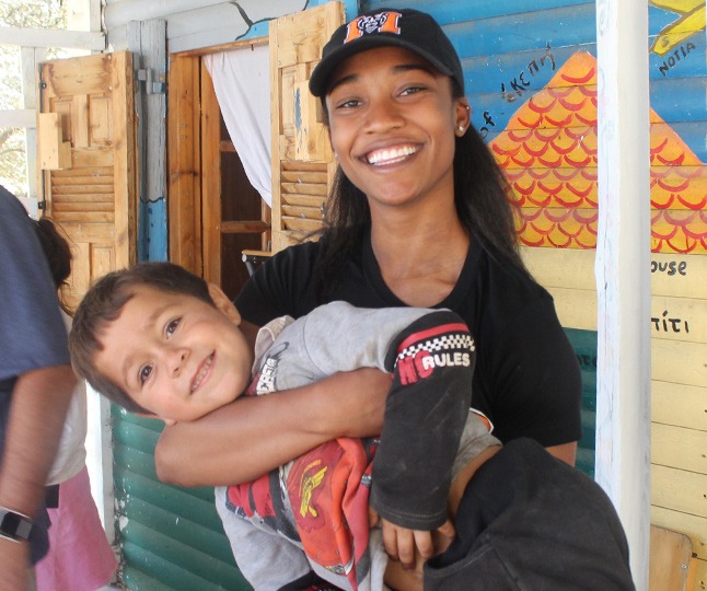 A Mercer student plays with a little boy during a Mercer On Mission trip.