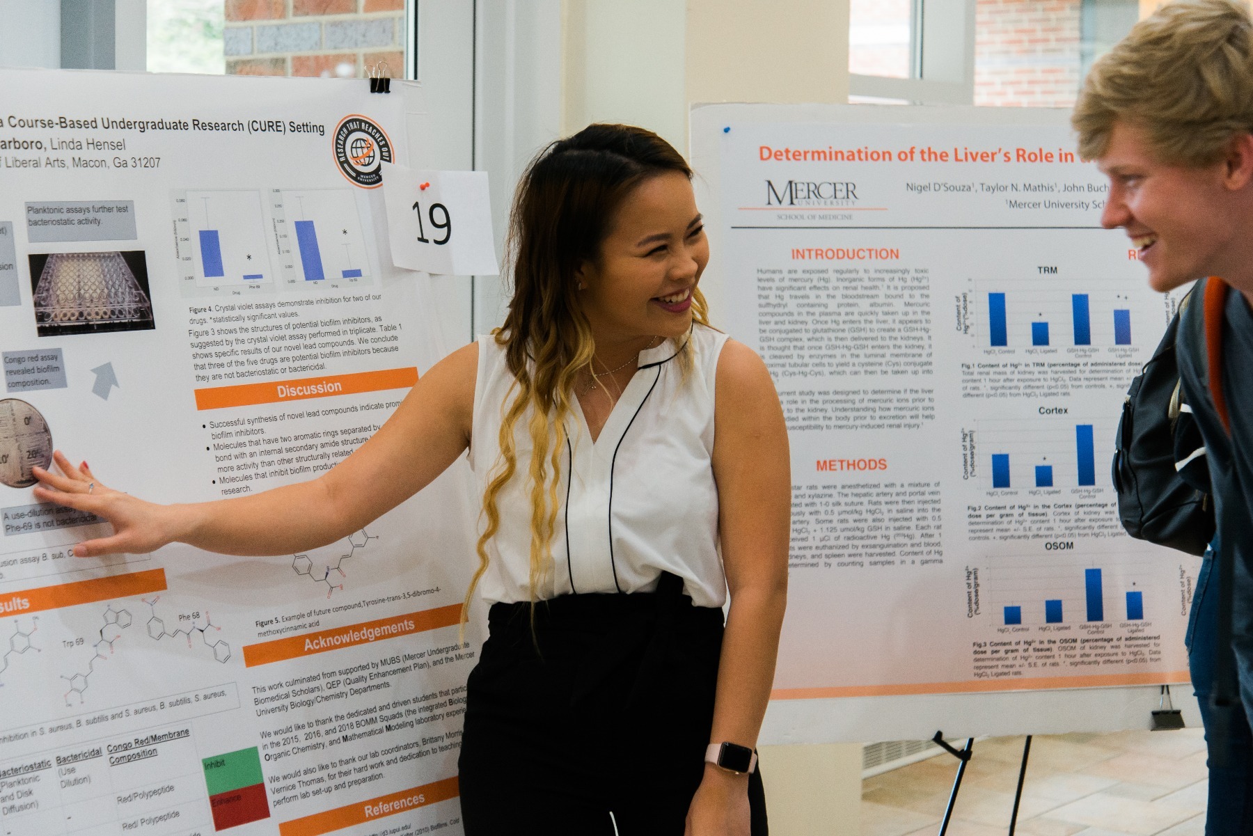 A student shows a poster at Bear Day 2019
