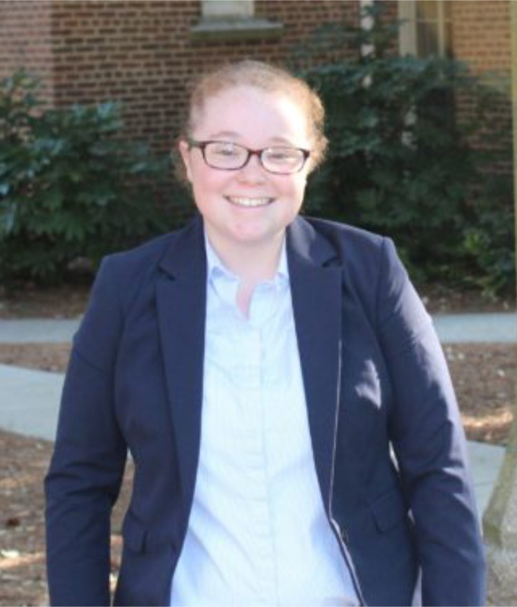 Taylor Rinberger stands on Mercer's campus
