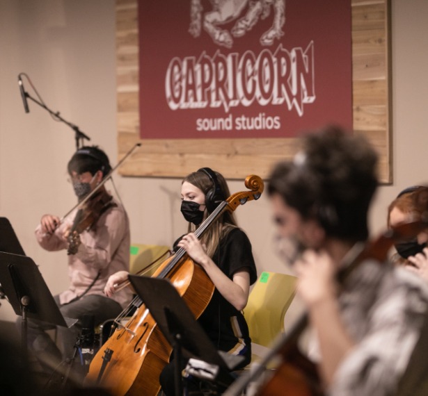 mercer students playing strings instruments record in capricorn sound studios
