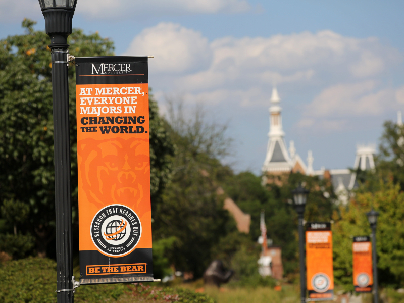A campus banner reads 