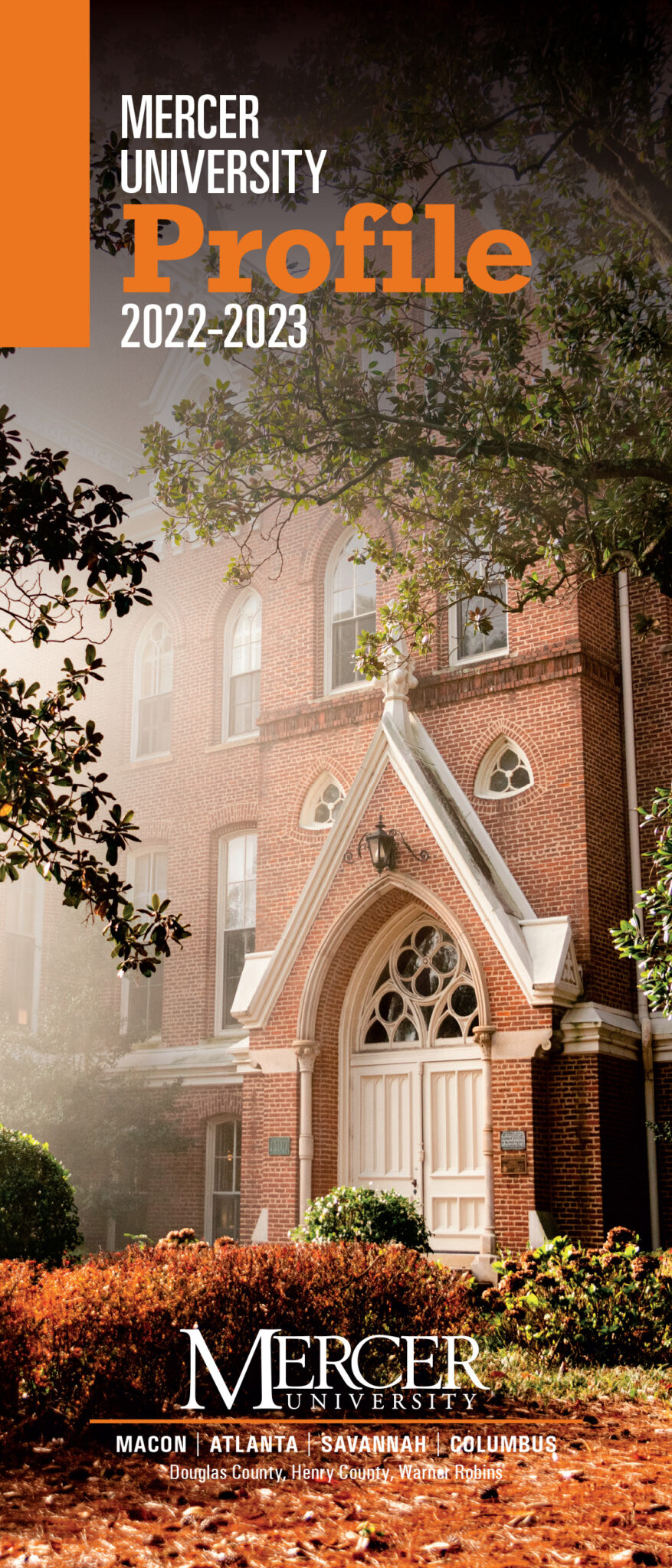 the cover of the mercer profile shows the front of the administration building cloaked in fog. text reads mercer university profile 2022-2023
