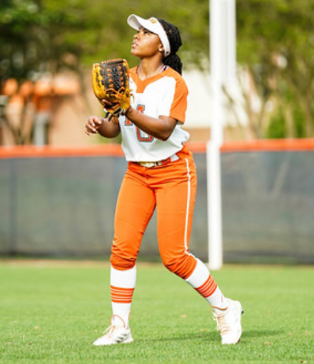 Alyssa Woods playing softball