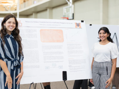 two women stand in front of a poster with the title: relationship richness: friendship satisfaction and parental management by income