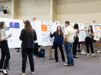 Mercer University students present their research posters at BEAR Day.