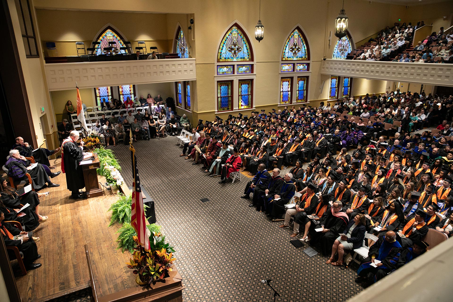 Students sitting in an auditorium during Baccalaureate