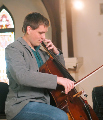 Daniel Stein playing the cello.