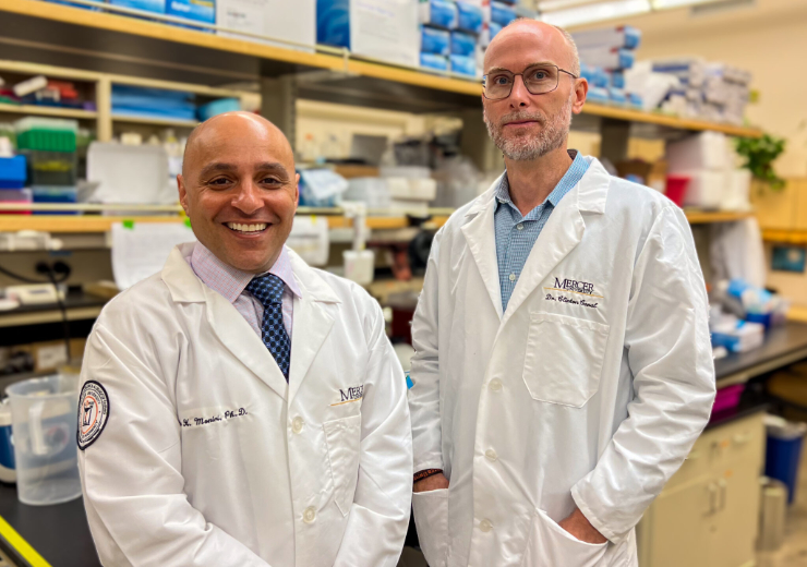 Dr. Nader Moniri and Dr. Clinton Canal from the Mercer College of Pharmacy in a research lab.
